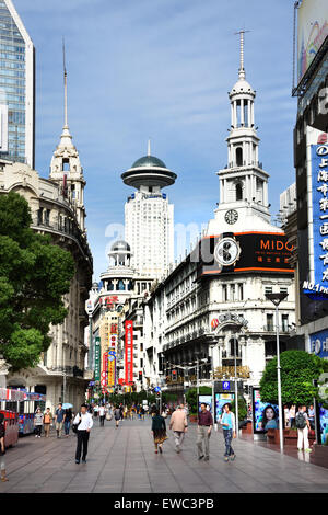 Visitors at Nanjing Road. Main shopping street of Shanghai. One of the busiest shopping streets in the world .  East Nanjing Roa Stock Photo