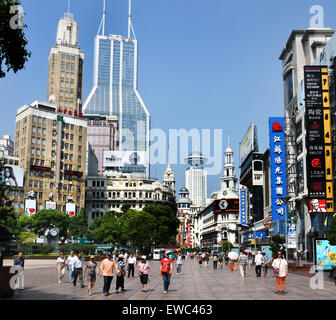 Visitors at Nanjing Road. Main shopping street of Shanghai. One of the busiest shopping streets in the world . East Nanjing Road Stock Photo