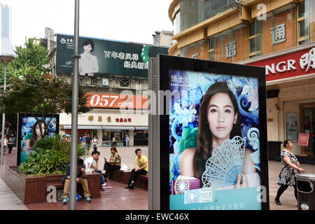 Visitors at Nanjing Road. Main shopping street of Shanghai. One of the busiest shopping streets in the world .  East Nanjing Roa Stock Photo