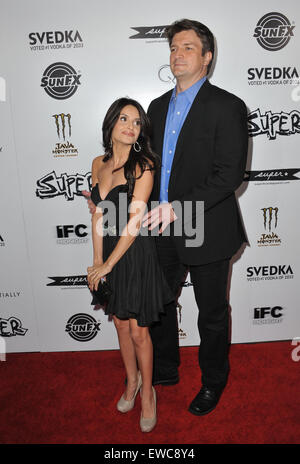 LOS ANGELES, CA - MARCH 21, 2011: Nathan Fillion & Mikaela Hoover at the Los Angeles premiere of their new movie 'Super' at the Egyptian Theatre, Hollywood. Stock Photo