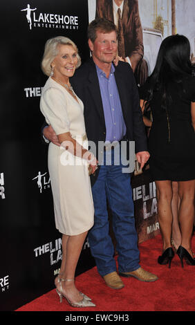 LOS ANGELES, CA - MARCH 10, 2011: Mary Kathleen 'Kay' McCabe (mother of Matthew McConaughey) & son Rooster McConaughey at the Los Angeles premiere of his new movie 'The Lincoln Lawyer' at the Cinerama Dome, Hollywood. Stock Photo