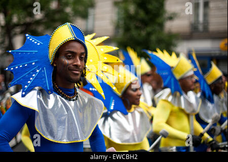 Paris, France - July 7, 2012: Performers on streets of Paris at the annual summer tropical carnival. Stock Photo