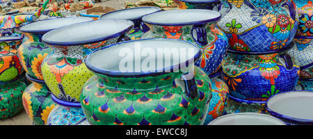 Colourful Mexican Talavera planters for sale at a gift shop in Mexico Stock Photo