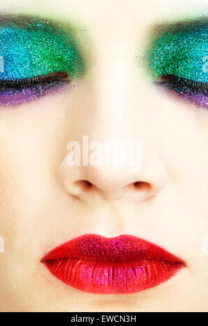 Shining holiday spangled female eye makeup Stock Photo