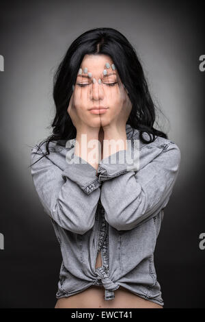 Multi exposure portrait of emotional brunette. Stock Photo