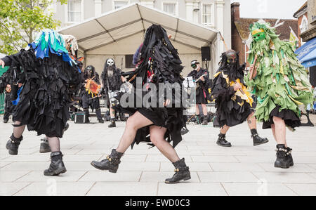 Mythago Border Morris traditional folk dancing in ragged costumes at Wimborne Folk Festival in 2015 Stock Photo