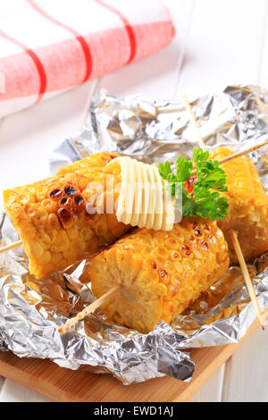 Grilled corn on the cob with butter Stock Photo