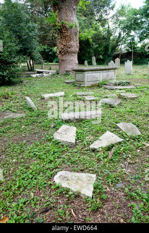 Broken pieces of gravestones scattered in UK cemetery Stock Photo