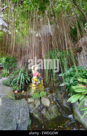 Hanging tree vines mark the entrance to Wat Saket (The Golden Mount) in Bangkok, Thailand Stock Photo