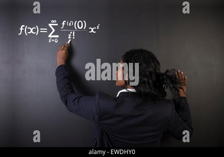 Learn maths, science or chemistry formula confident beautiful South African or African American woman teacher or student Stock Photo