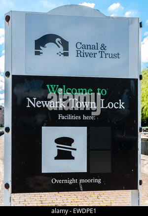 Canal & River Trust sign on River Trent at Newark Town Lock, Newark-on-Trent, Nottinghamshire - Welcome to Newark Town Lock Stock Photo