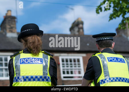 Pair of police officers on duty in Appleby at the New Fair, Cumbria, UK Stock Photo