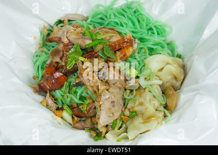 Street food in chinese style, jade noodle with roasted duck and pork dumpling Stock Photo