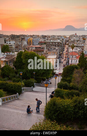 People enjoying the view of the city of Patras from the staircase leading from city centre to the top of the castle hill Stock Photo