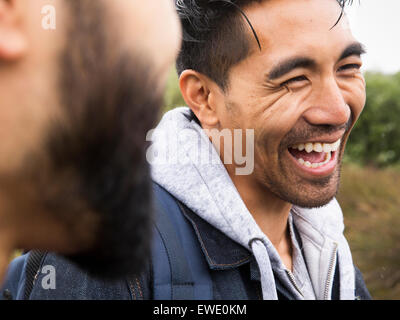 Close up of two smiling young men Stock Photo