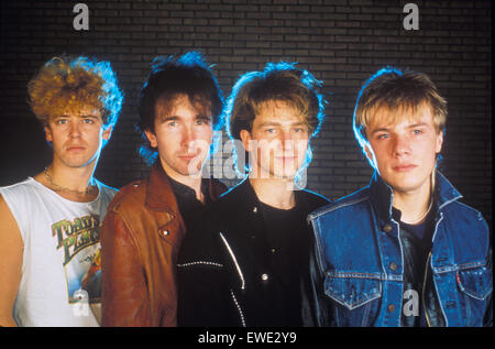 U2 rock group in 1982. From left:  Larry Mullen Jnr, The Edge, Bono, Adam Clayton. Photo van Houten Stock Photo