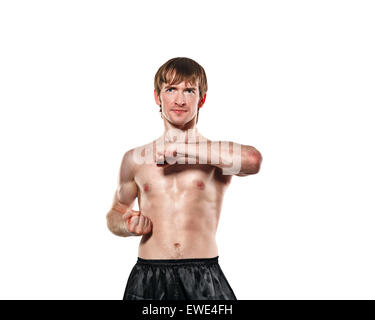 The man trains kata kung fu training to strike. Isolated on white background. The concept of masculine strength Stock Photo
