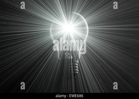 Halogen light bulb on dark background with light rays. Stock Photo