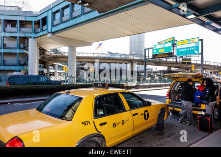 New York City,NY NYC,Queens,LaGuardia Airport,LGA,outside exterior,taxi,cab,picking up passenger,NY150325011 Stock Photo