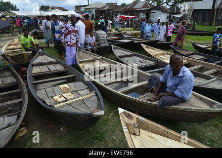 Boat makers display the wooden boat for sale at Kaikkarateke market , Narayanganj district in Bangladesh. On June 21, 2015 Stock Photo