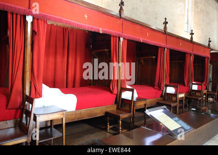 Beds for patients at the Hospices de Beaune founded by Nicolas Rolin in 1443, Beaune, Cote d'Or, Burgundy, France Stock Photo