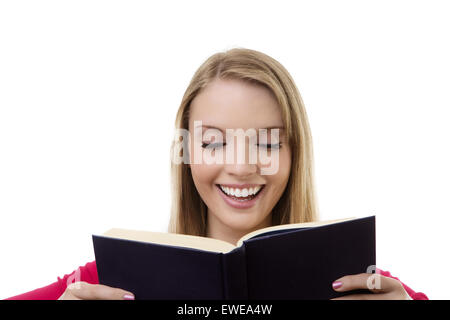 woman reading a hard back book Stock Photo