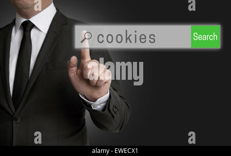 cookies internet browser is operated by businessman. Stock Photo