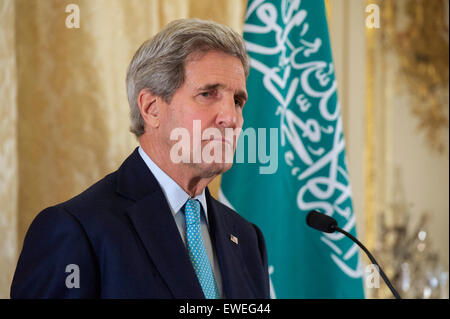 U.S. Secretary of State John Kerry listens as Saudi Foreign Minister Adel al-Jubeir announces that a cease fire in Yemen will begin Tuesday, following a meeting of the Gulf Cooperation Council on May 8, 2015, in Paris, France. Stock Photo