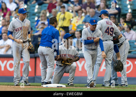 Milwaukee, WI, USA. 23rd June, 2015. New York Mets second baseman Dilson Herrera #2 is looked at after a collision at first base in the Major League Baseball game between the Milwaukee Brewers and the New York Mets at Miller Park in Milwaukee, WI. John Fisher/CSM/Alamy Live News Stock Photo