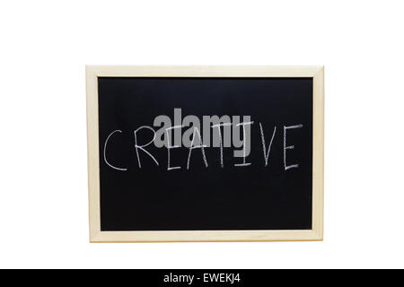 CREATIVE written with white chalk on blackboard. Stock Photo