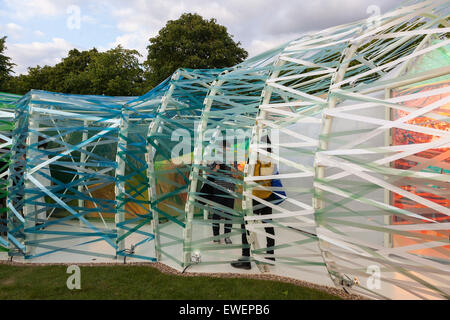 London, UK. 23rd June, 2015. The Serpentine Gallery's annual Pavilion in Hyde Park, was unveiled to the public on 23rd June 2015. The multi-coloured ETFE wrapped framework, was designed by Spanish Architects SelgasCano. Credit:  galit seligmann/Alamy Live News Stock Photo