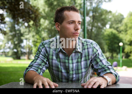 Young man contemplating Stock Photo