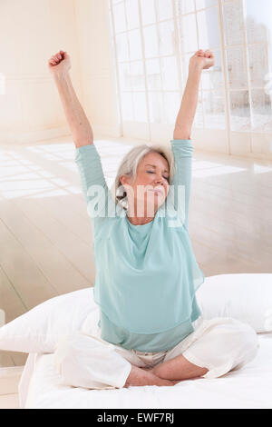 SENIOR STRETCHING Stock Photo