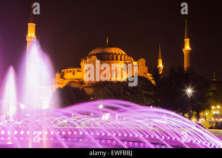 Sultanahmet park fountain and Hagia Sophia by night in Istanbul, Turkey. Stock Photo