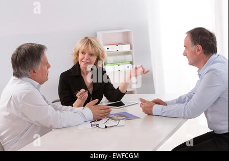 SENIOR WORKING Stock Photo