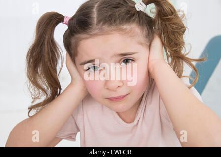 CHILD WITH EAR PAIN Stock Photo