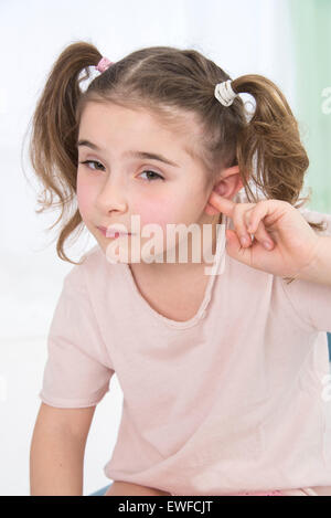 CHILD WITH EAR PAIN Stock Photo