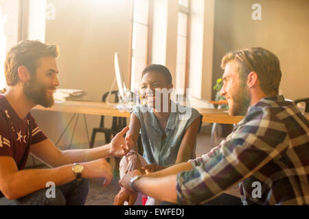 Casual business people talking in meeting in office Stock Photo