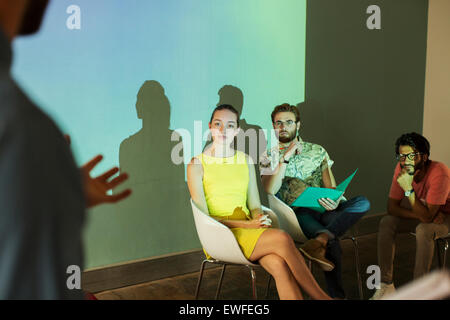 Business people preparing audio visual presentation Stock Photo