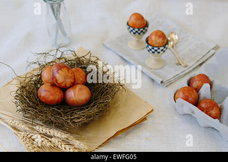 Traditional Easter eggs naturally dyed with flowers and onion skins, still life Stock Photo