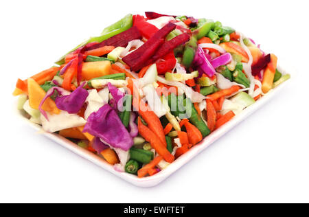 Sliced vegetables in a white box over white background Stock Photo