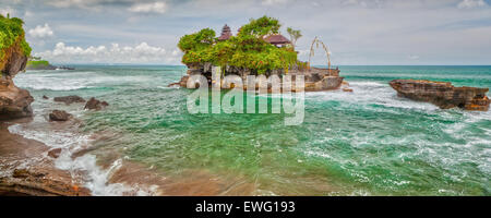 Panoramic view to Tanah Lot temple famous touristic landmark to visit at Bali, Indonesia Stock Photo