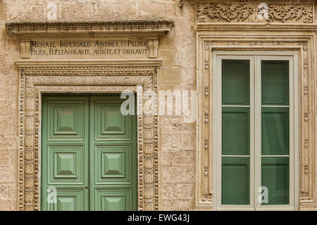 Italy Apulia Francavila Fontana  Imperiali castle door and window first floor in the courtyard Stock Photo