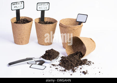 organic vases and dirt on whithe bacground Stock Photo