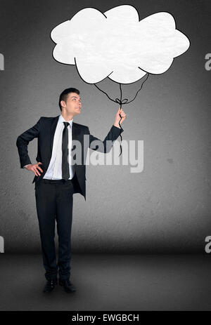 Business man holding cloud sketch Stock Photo