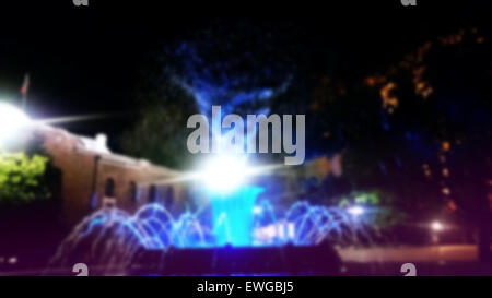 Blurred image of a fountain at night in Sofia, Bulgaria Stock Photo
