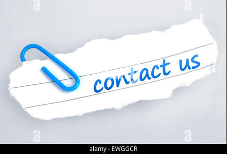 Contact us word on grey background Stock Photo