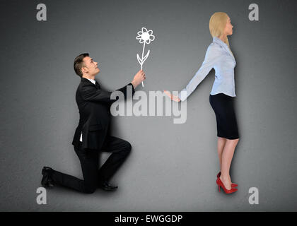 Business man giving flower to girlfriend Stock Photo