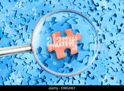 Strategy word on puzzle background Stock Photo