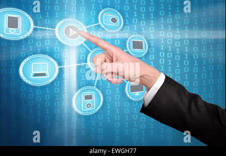 Hand press play on media buttons connection Stock Photo